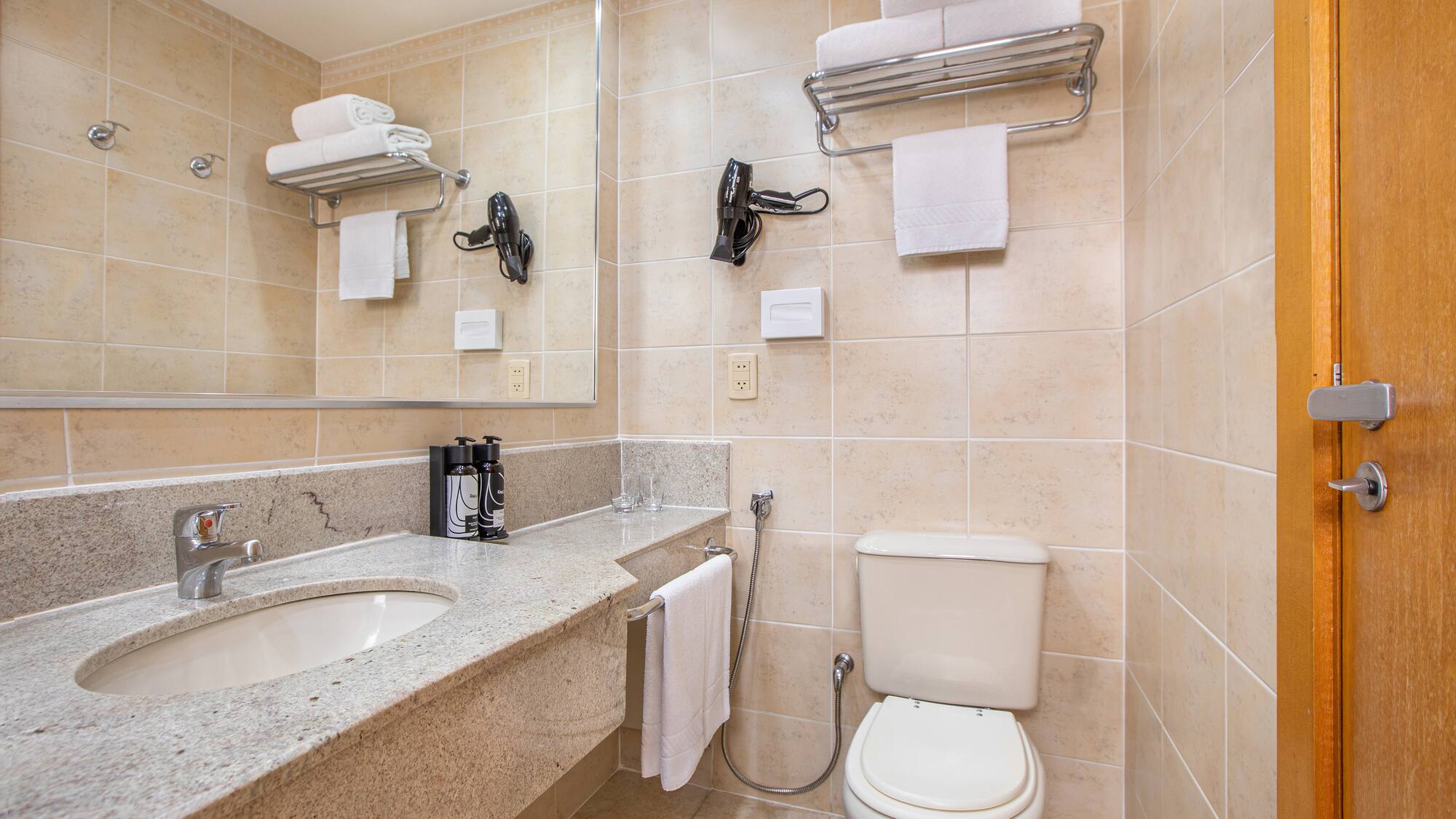 a bathroom with a sink and toilet