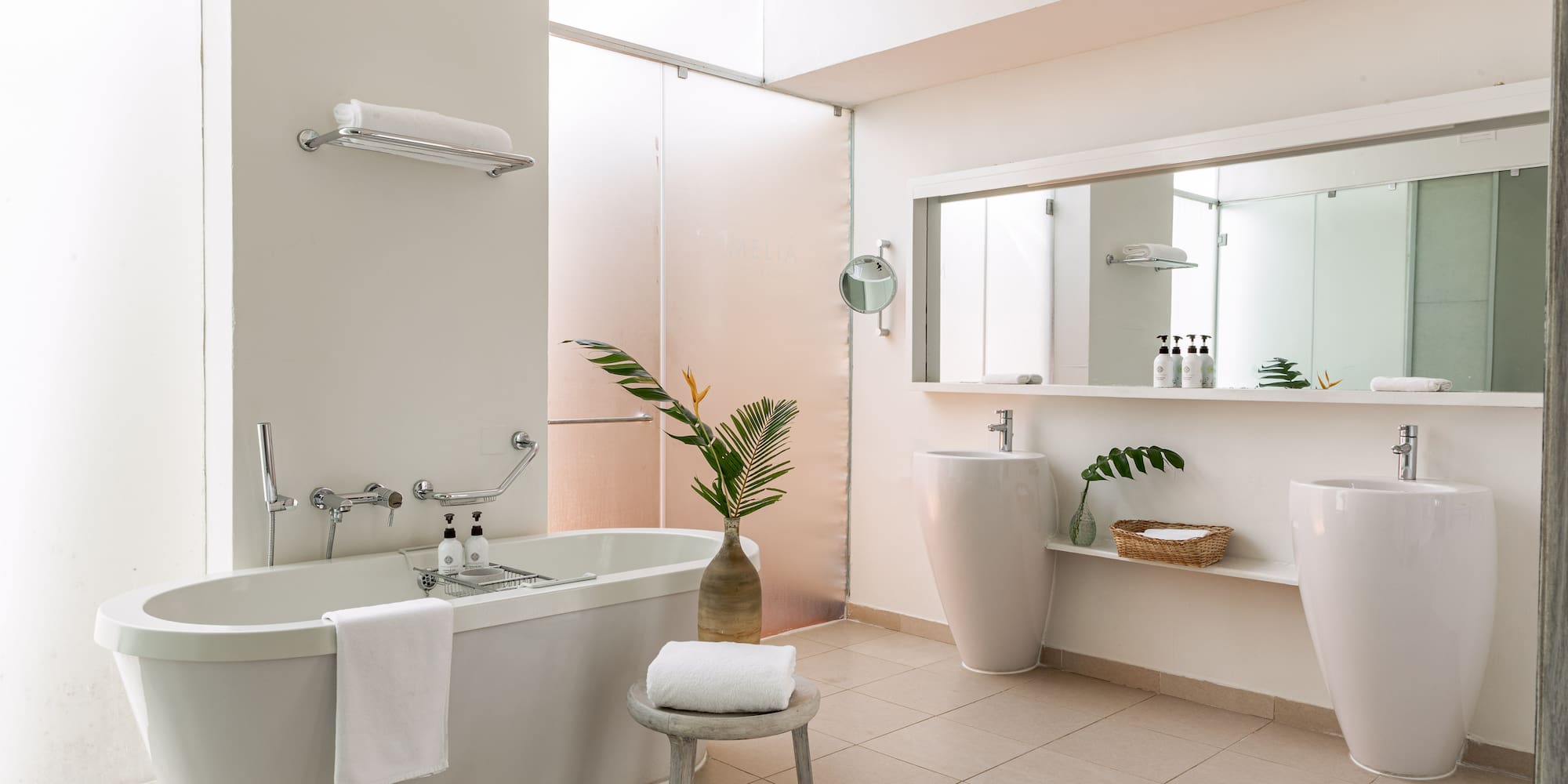 a bathroom with a tub and sink
