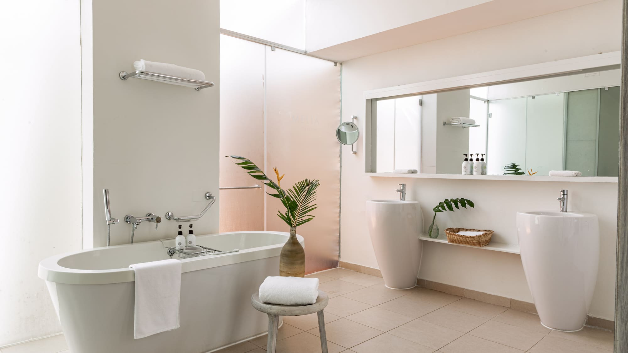 a bathroom with a tub and sink