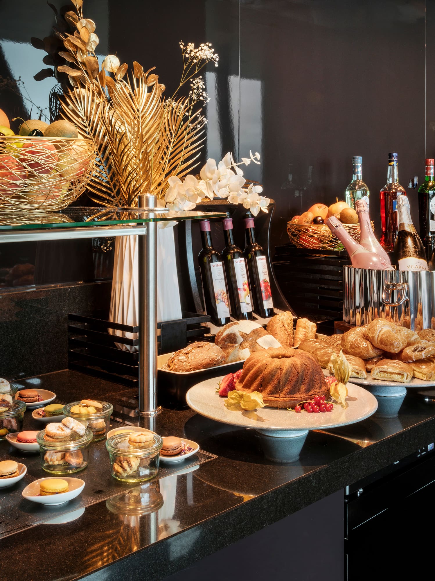 a buffet table with food and drinks