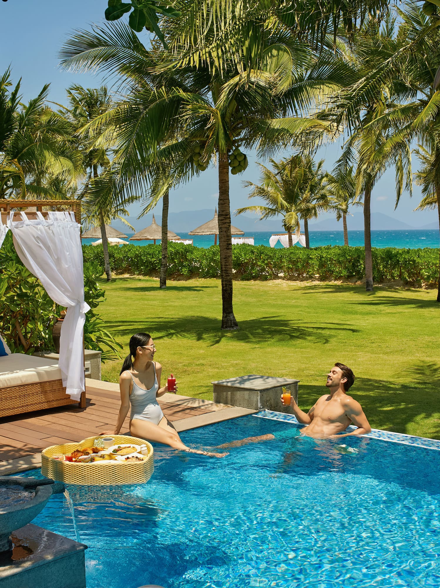 a man and woman in a pool