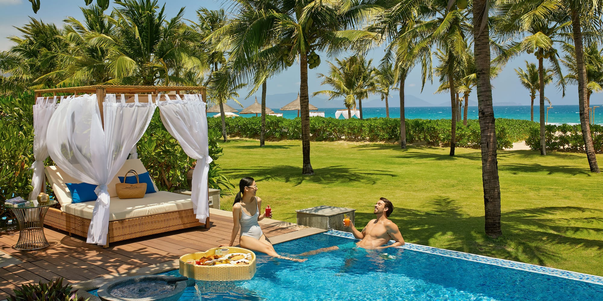 a man and woman in a pool