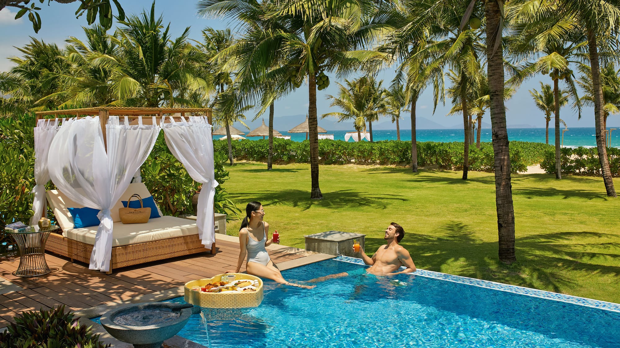 a man and woman in a pool