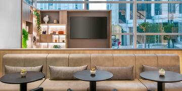 a room with a couch and a television