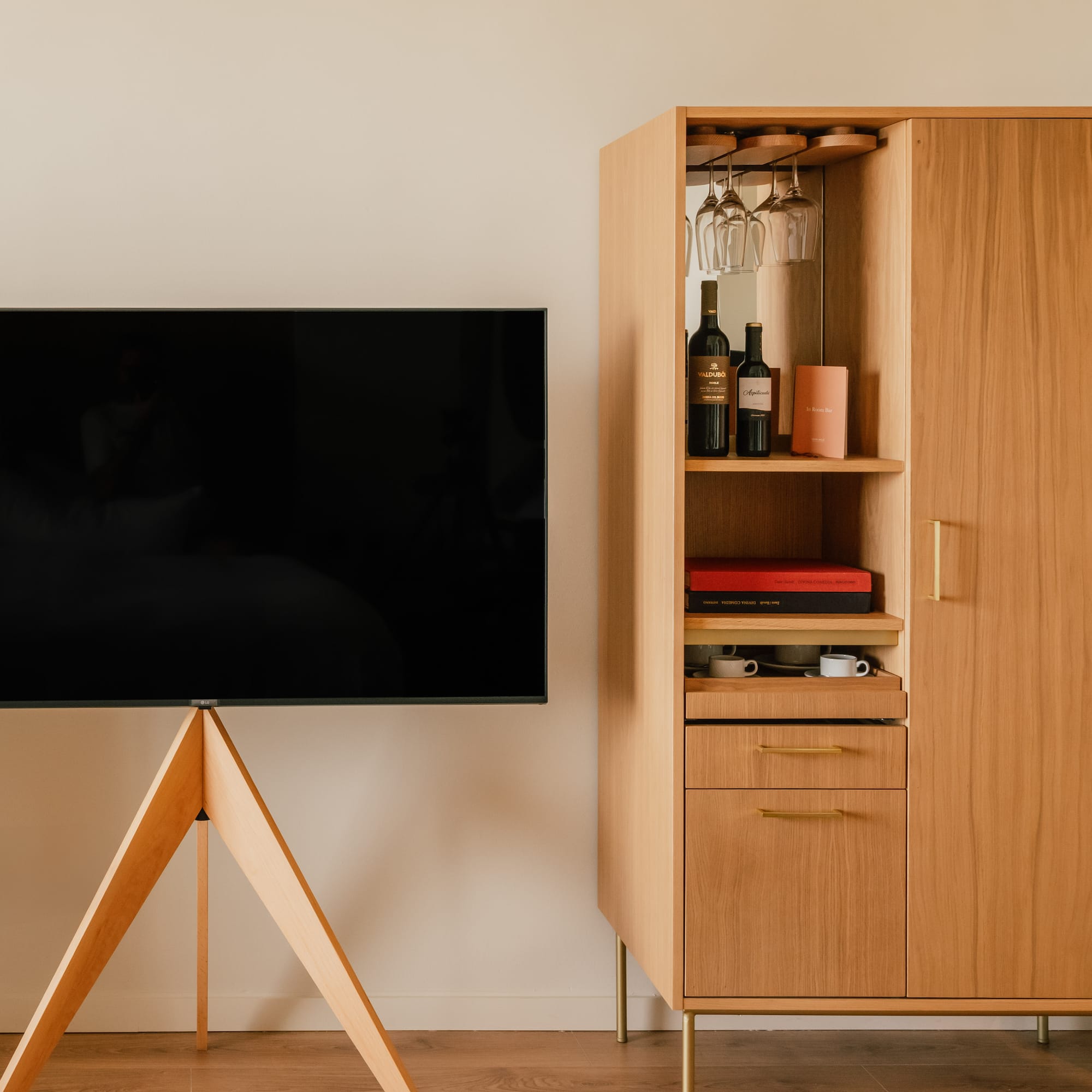 a tv and cabinet in a room