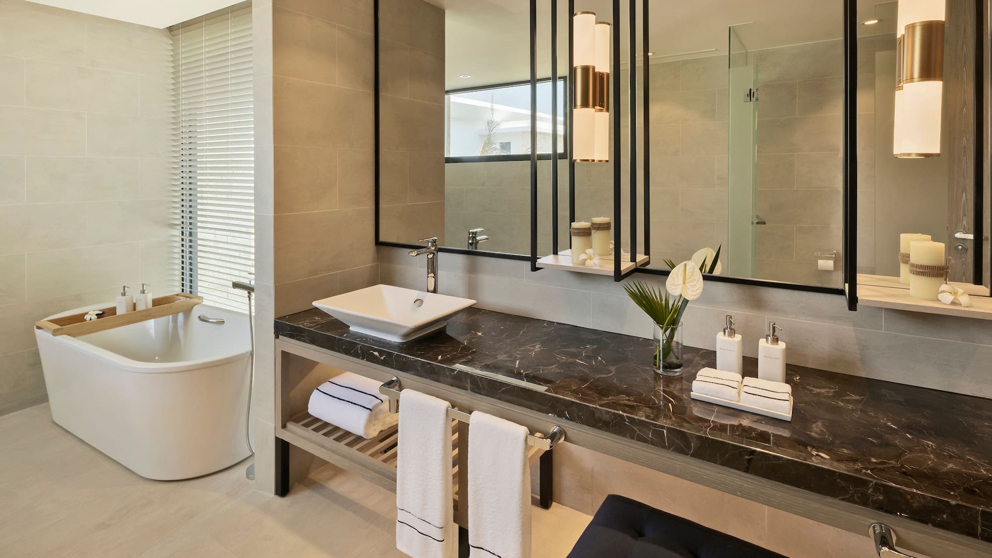 a bathroom with a mirror and sink