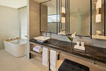 a bathroom with a mirror and sink