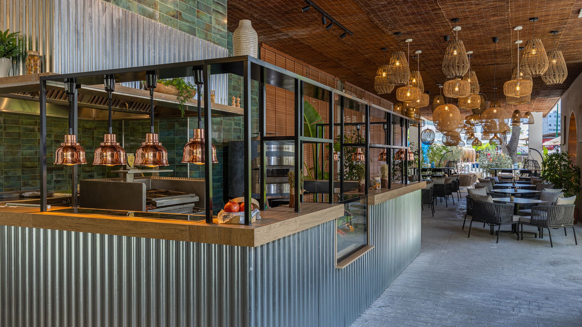 a restaurant with a bar and chairs