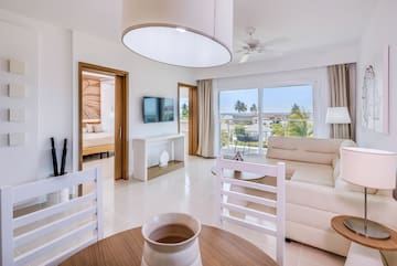 a room with a television and a couch