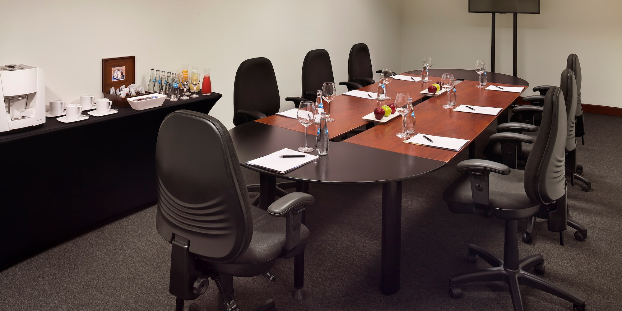 a conference room with chairs and a table
