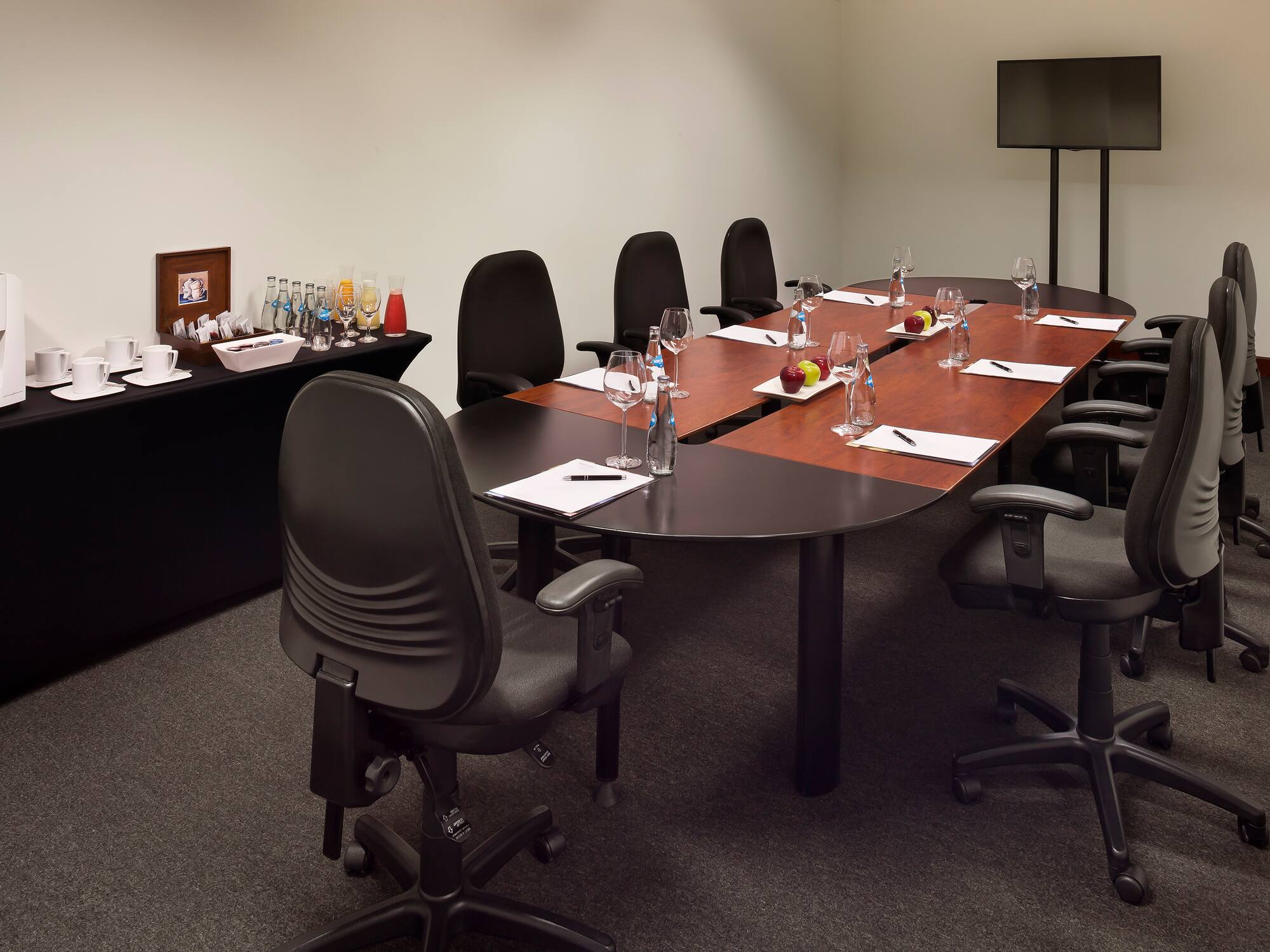 a conference room with chairs and a table