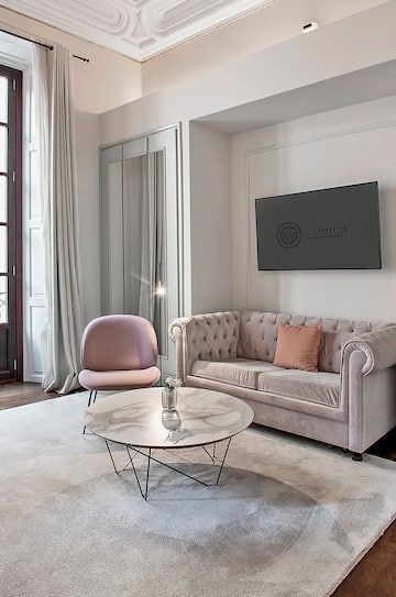 a living room with a couch and a coffee table