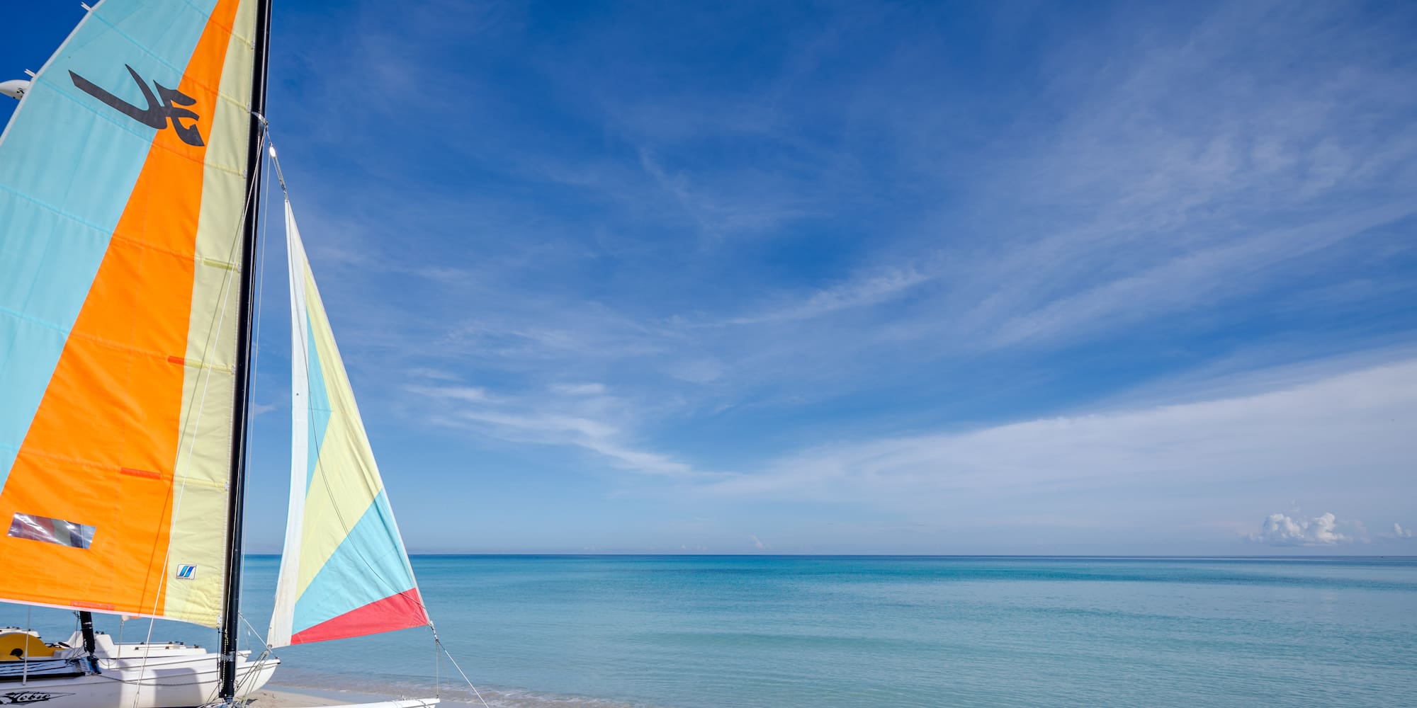 a sailboat on a beach