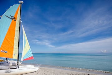 a sailboat on a beach