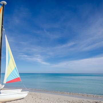 a sailboat on a beach