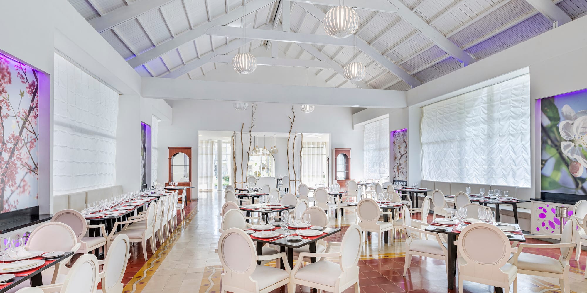 a room with tables and chairs