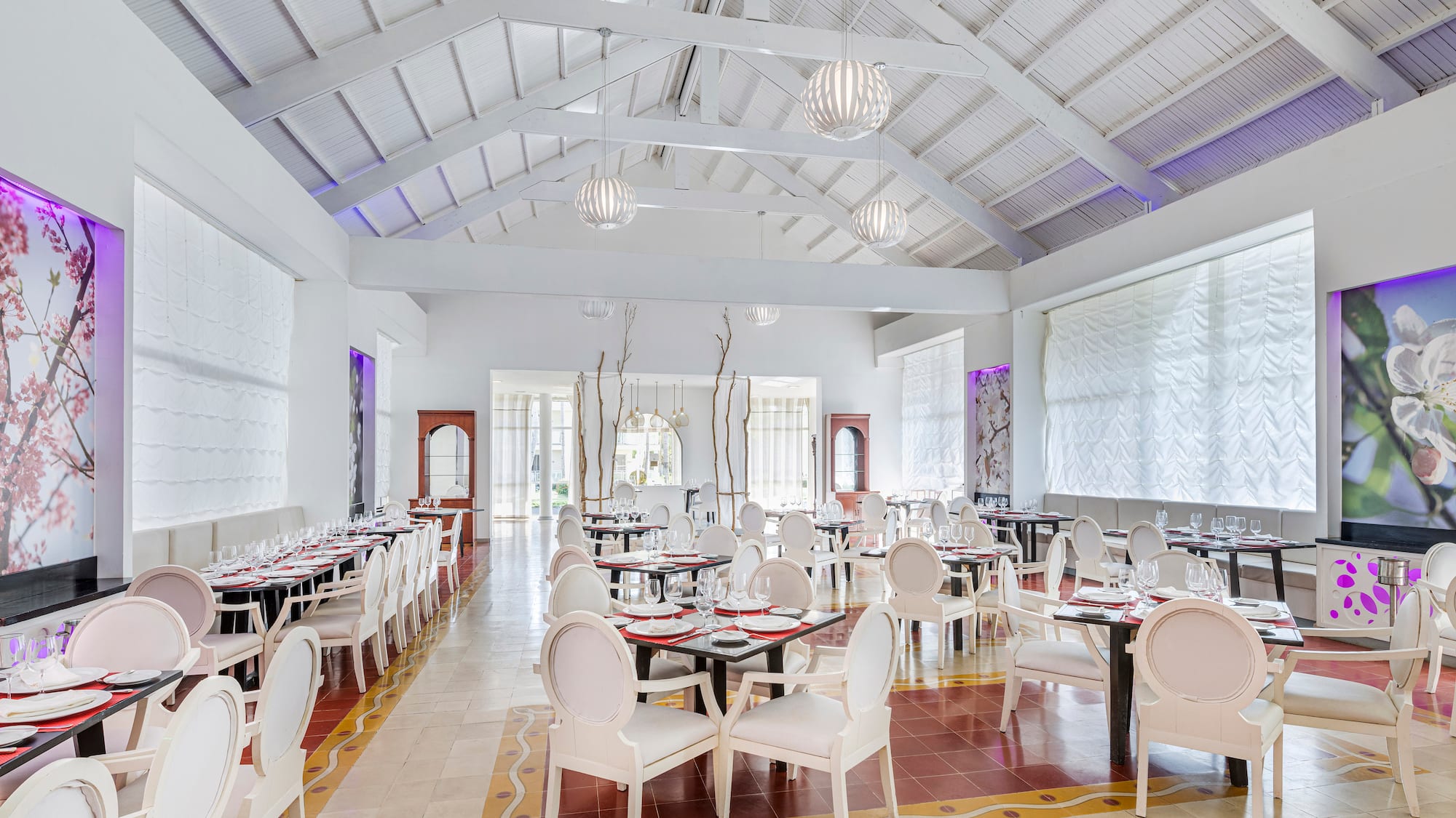 a room with tables and chairs