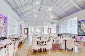 a room with tables and chairs