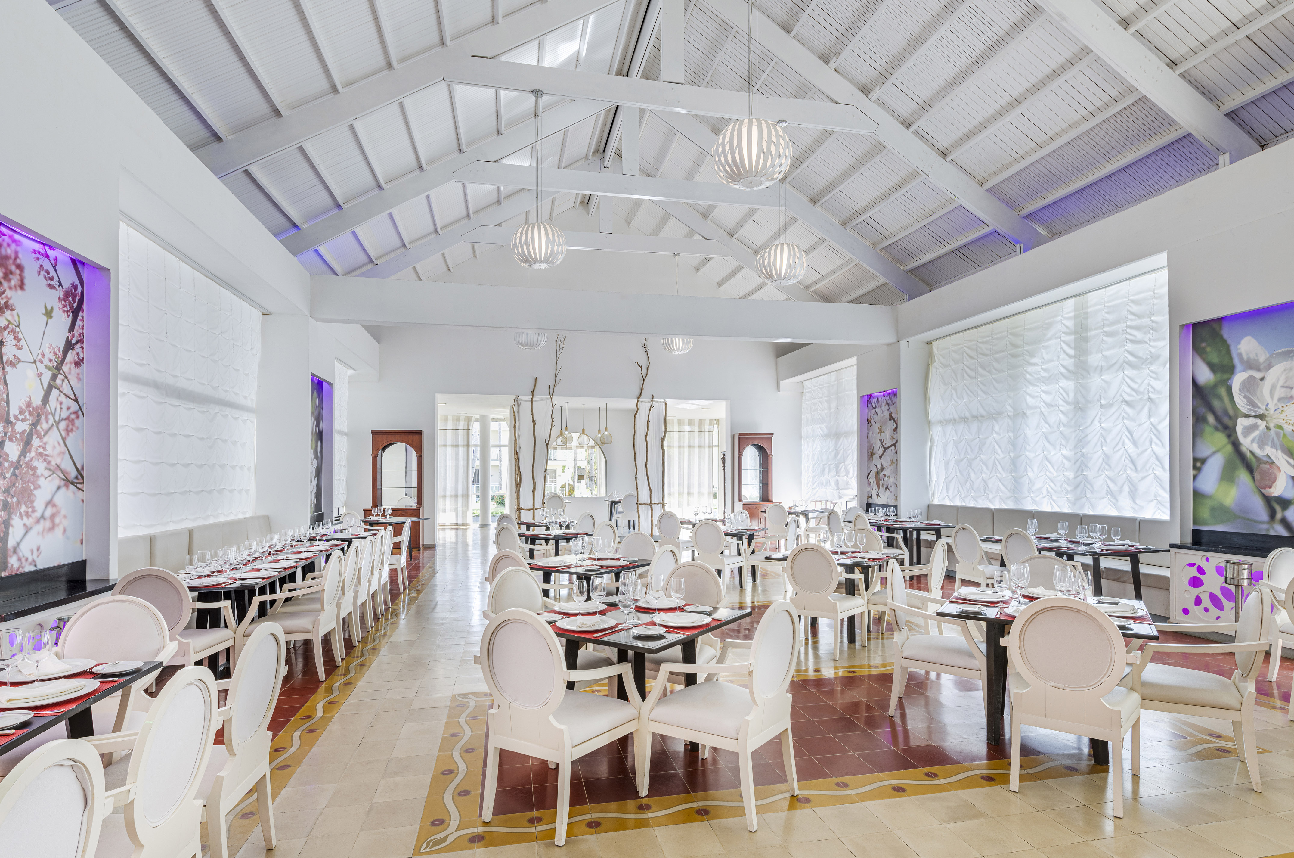 a room with tables and chairs