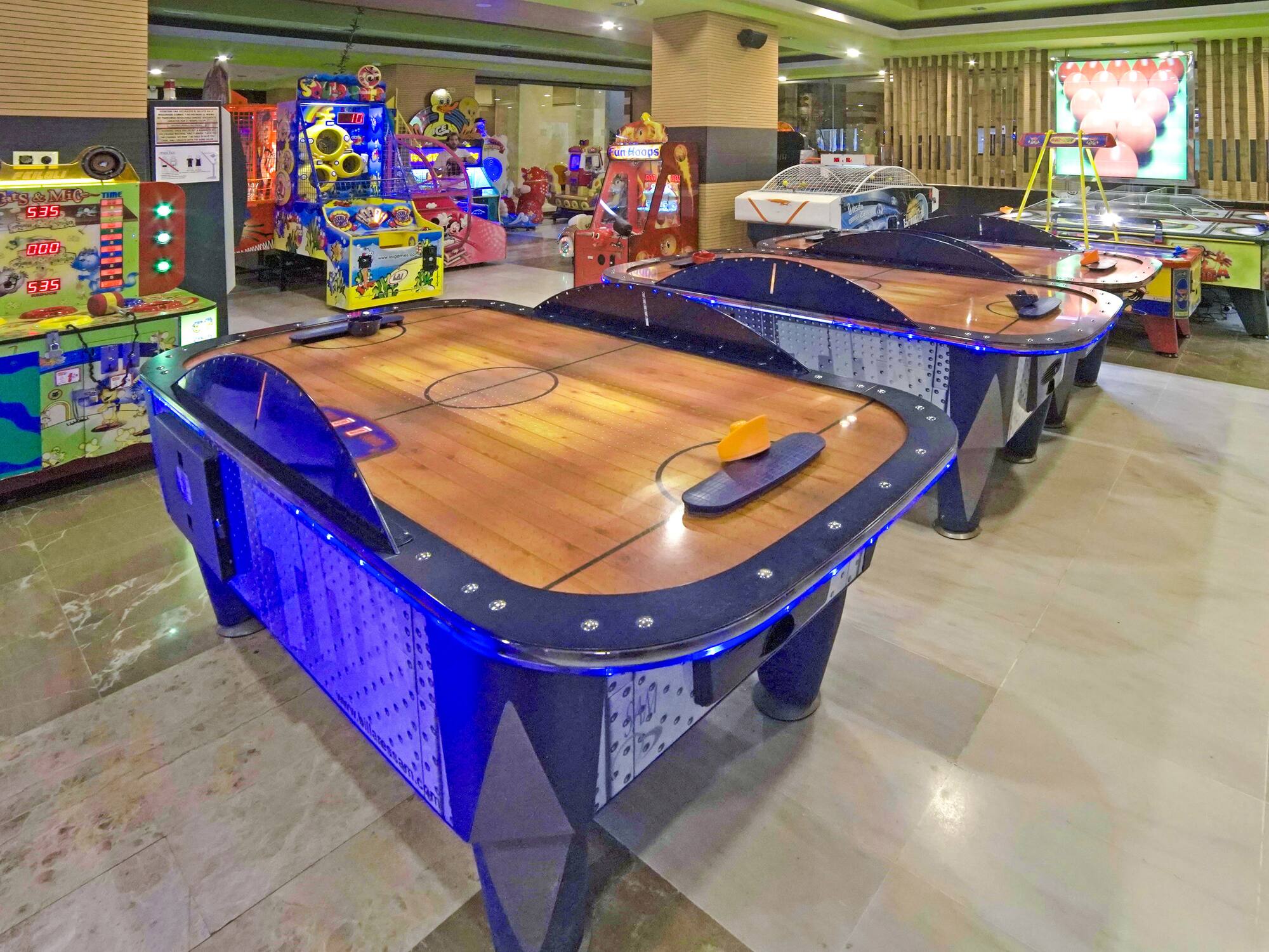 a game room with arcade games