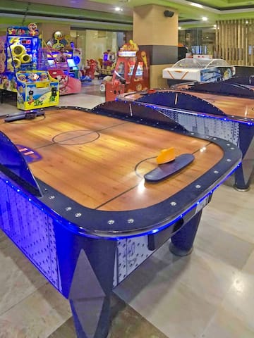 a game room with arcade games