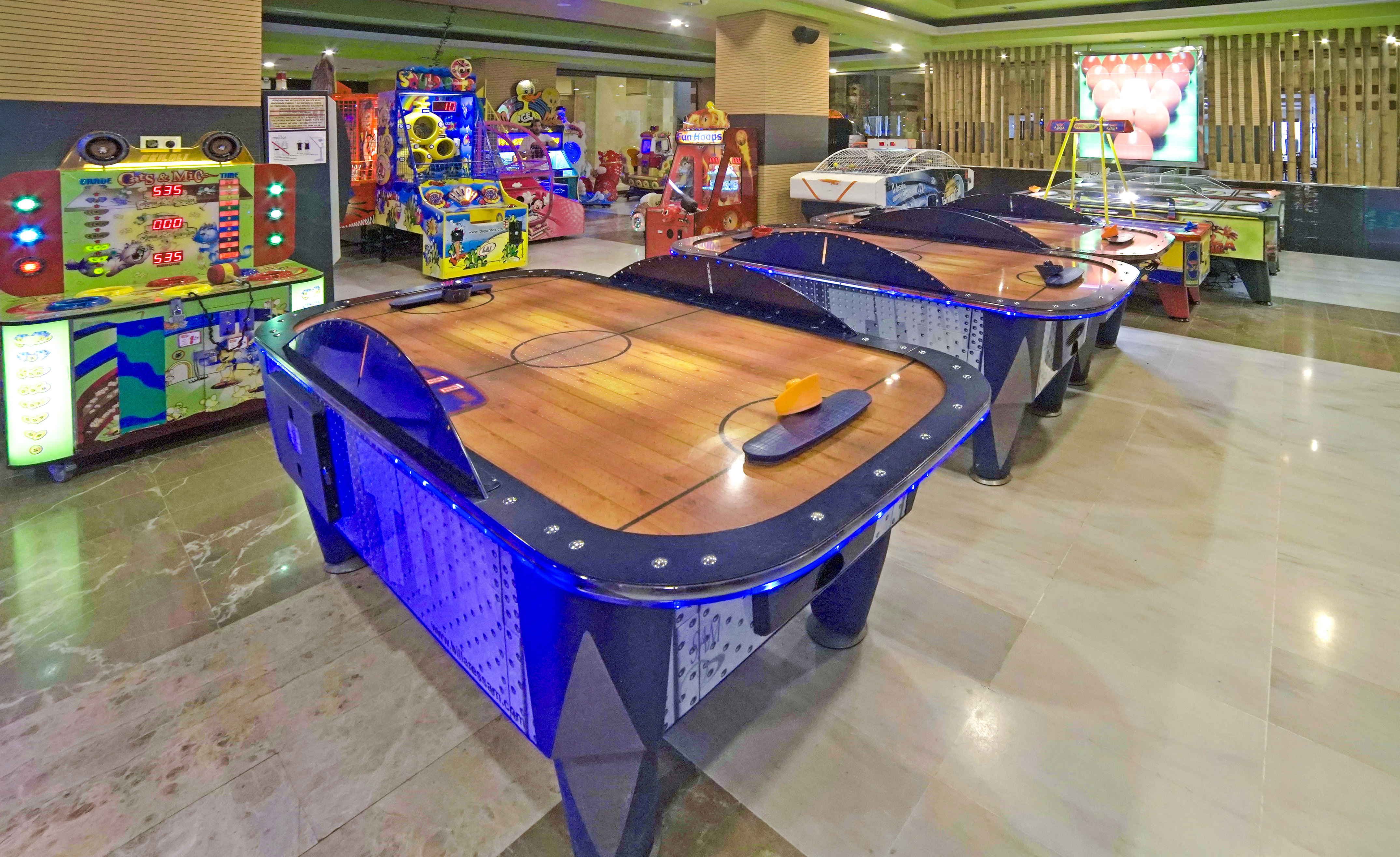 a game room with arcade games