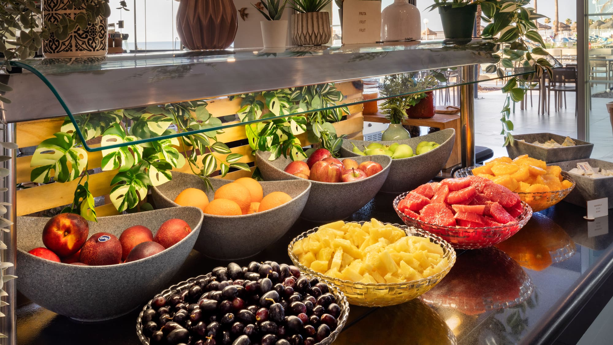a group of bowls of fruit