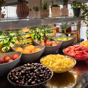 a group of bowls of fruit