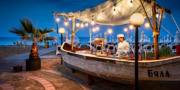 a man standing at a bar