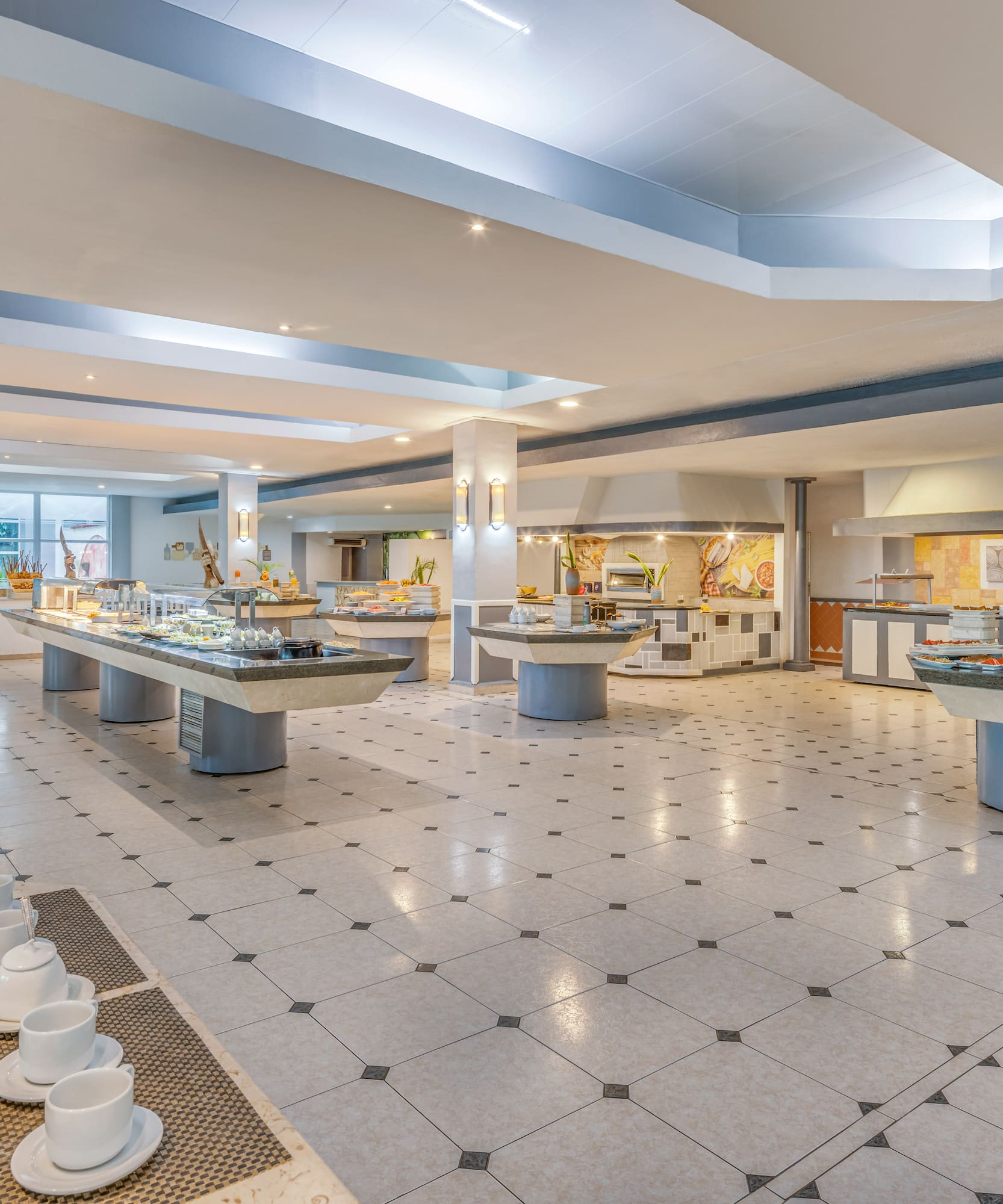 a large room with a buffet and a large counter