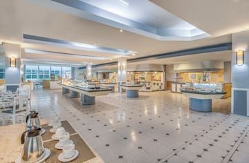 a large room with a buffet and a large counter