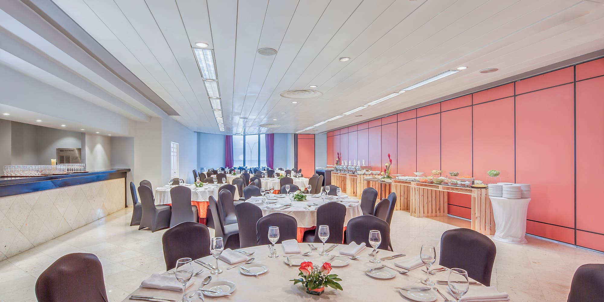 a room with tables and chairs