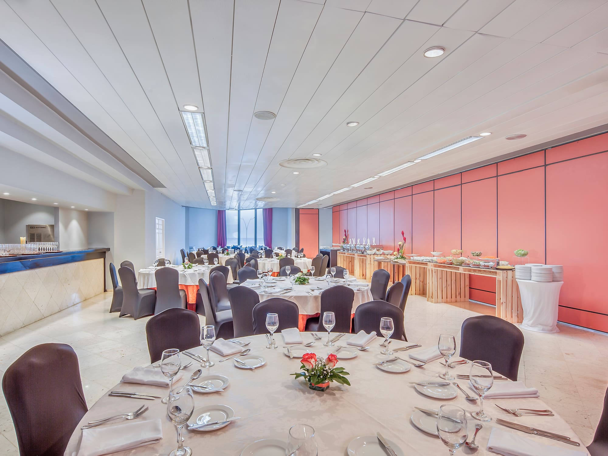 a room with tables and chairs