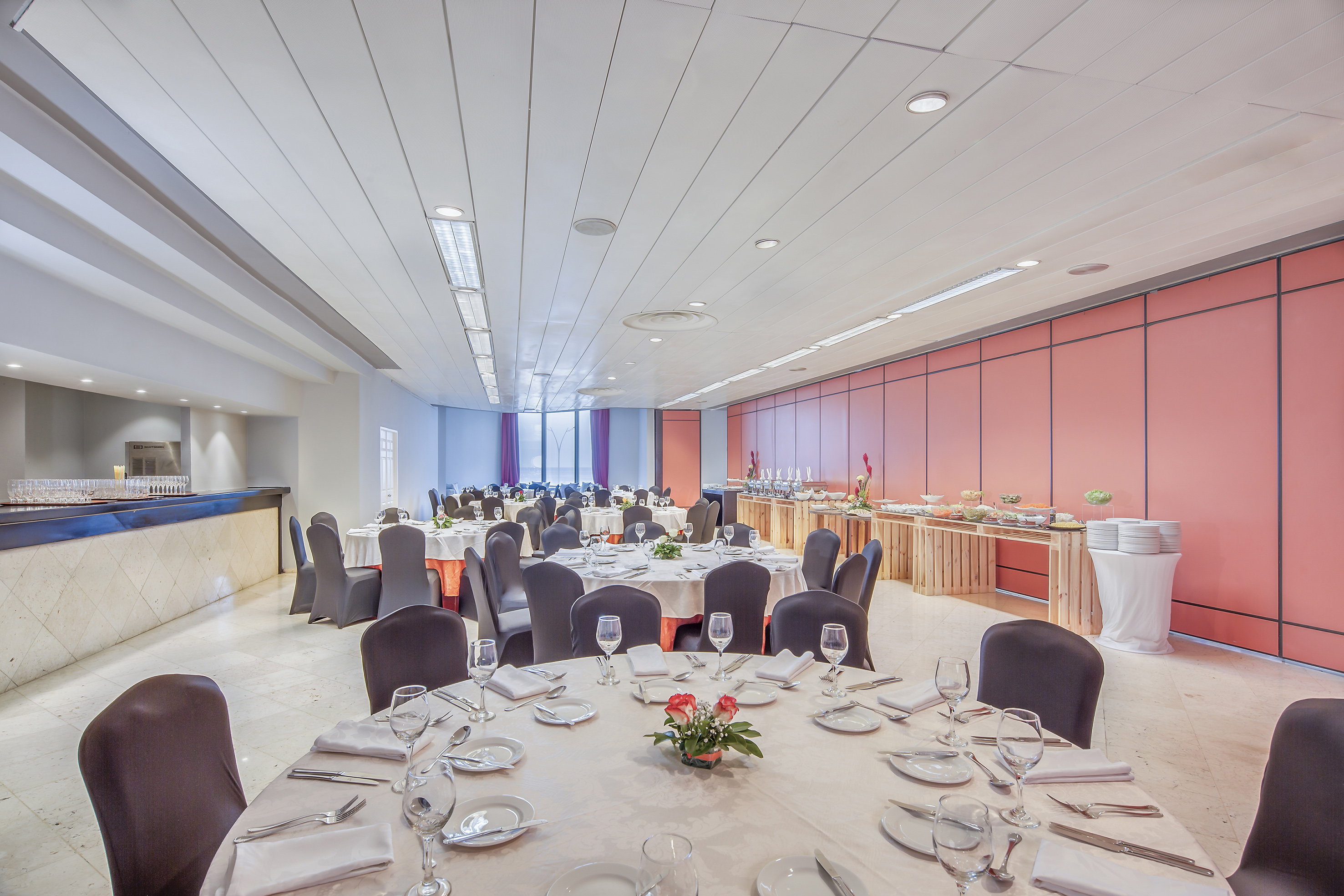 a room with tables and chairs