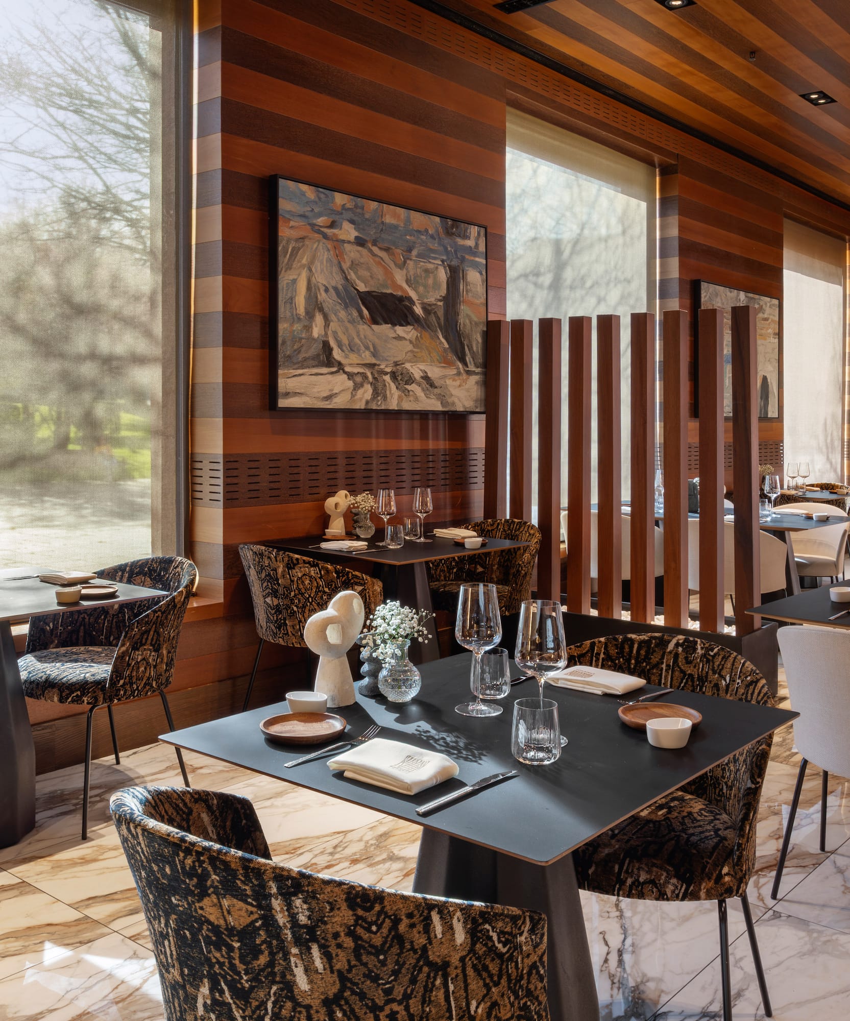 a restaurant with tables and chairs