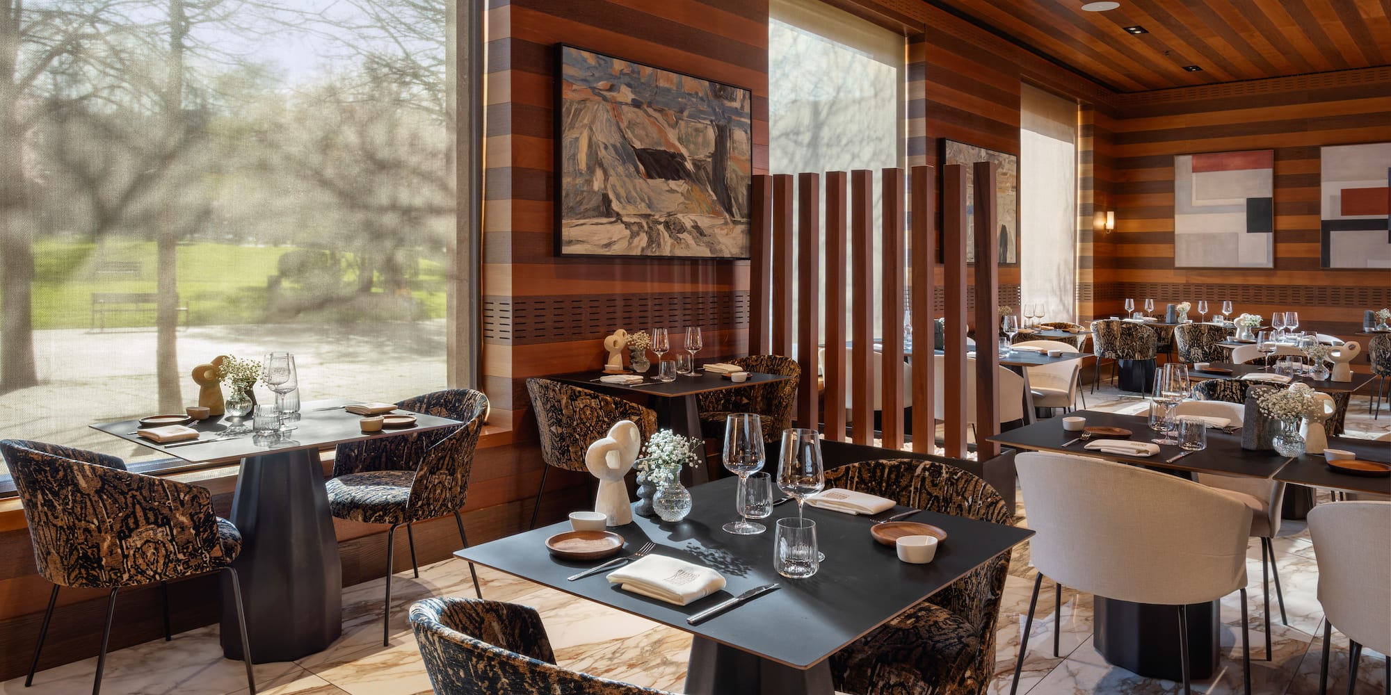 a restaurant with tables and chairs