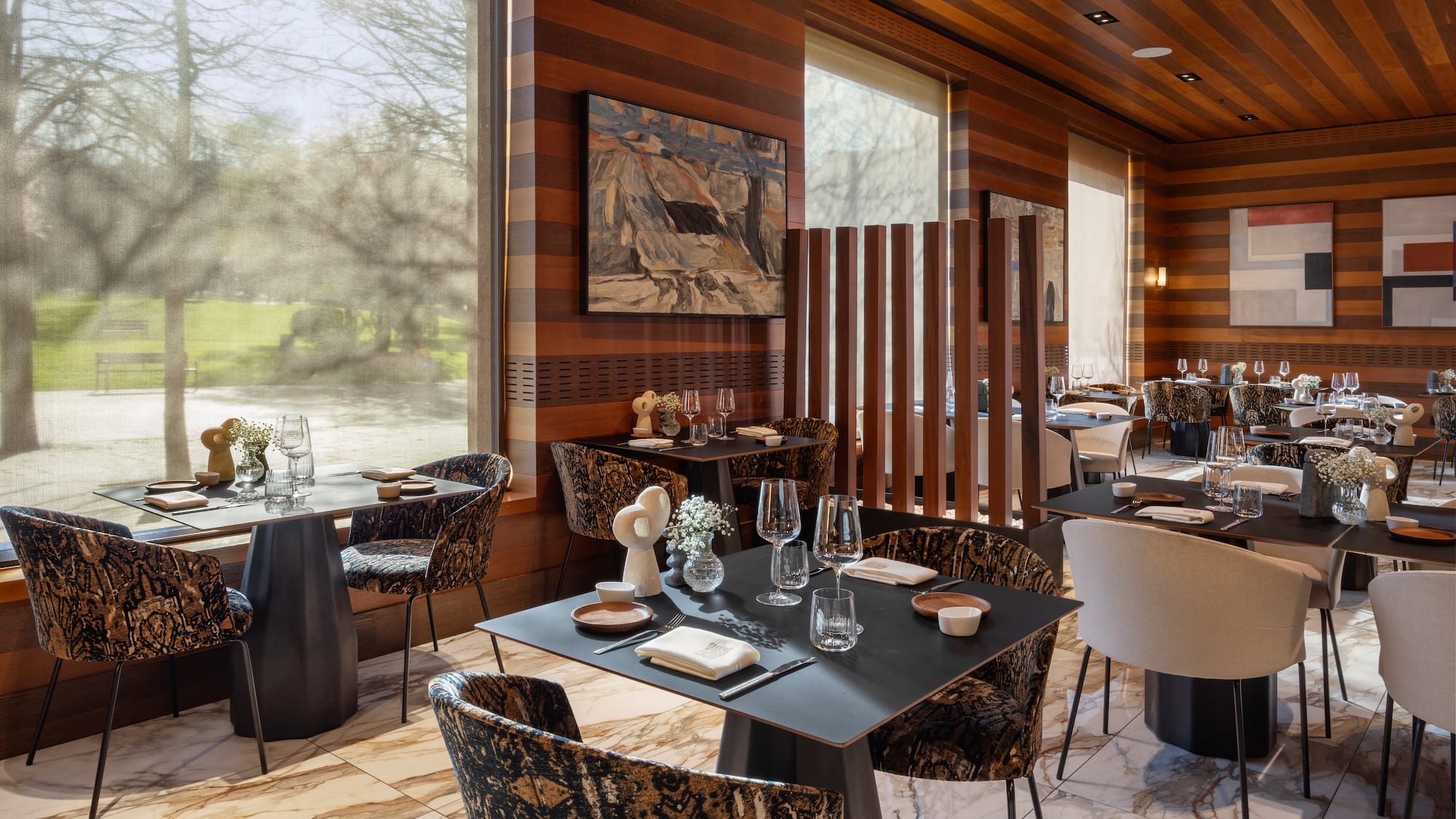 a restaurant with tables and chairs