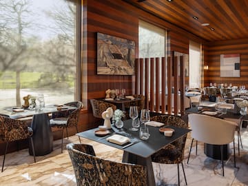 a restaurant with tables and chairs