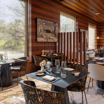 a restaurant with tables and chairs