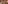 a bar with a glass ceiling and a chandelier