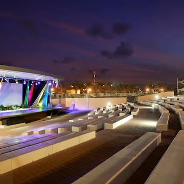 a outdoor stage with lights and seating