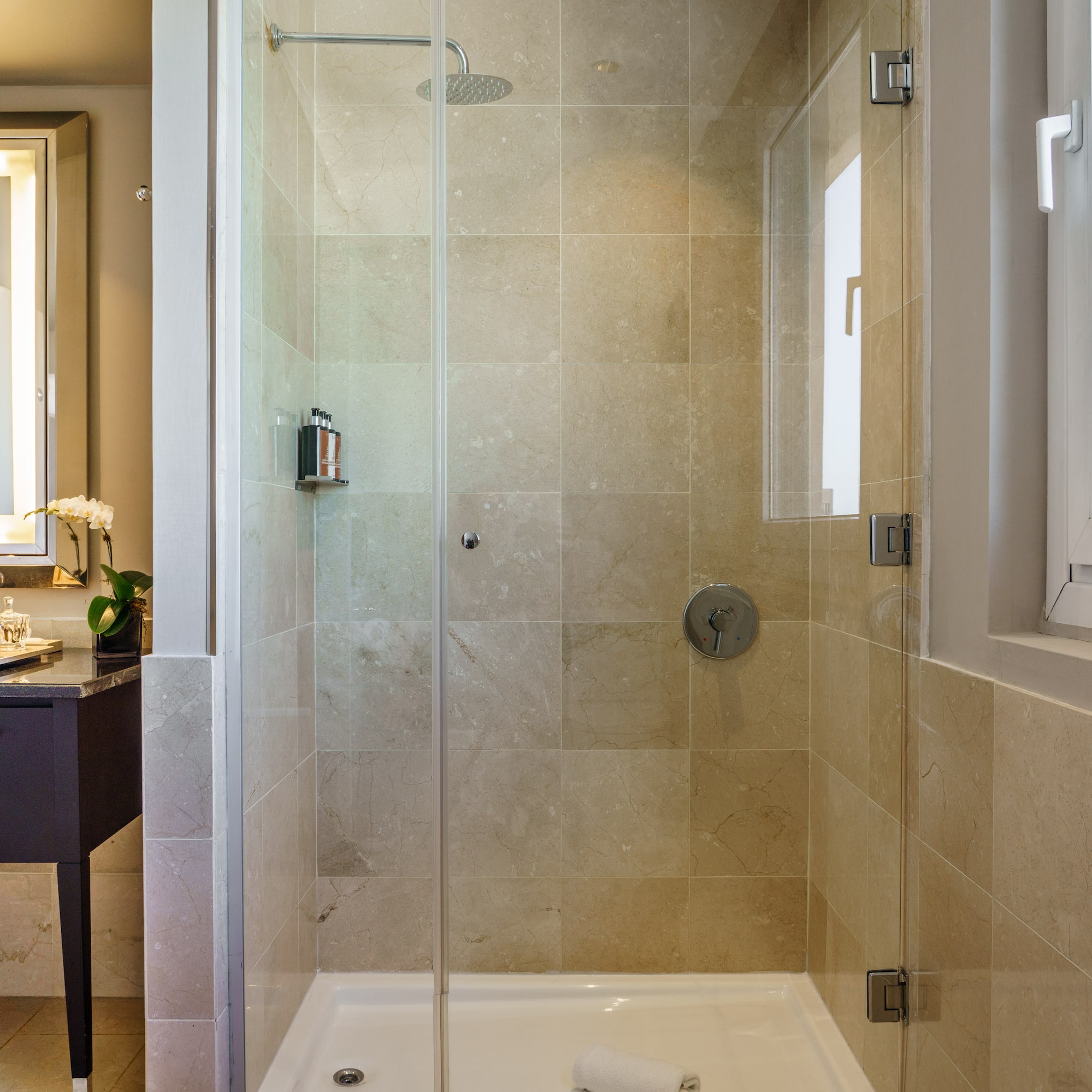 a shower with glass doors