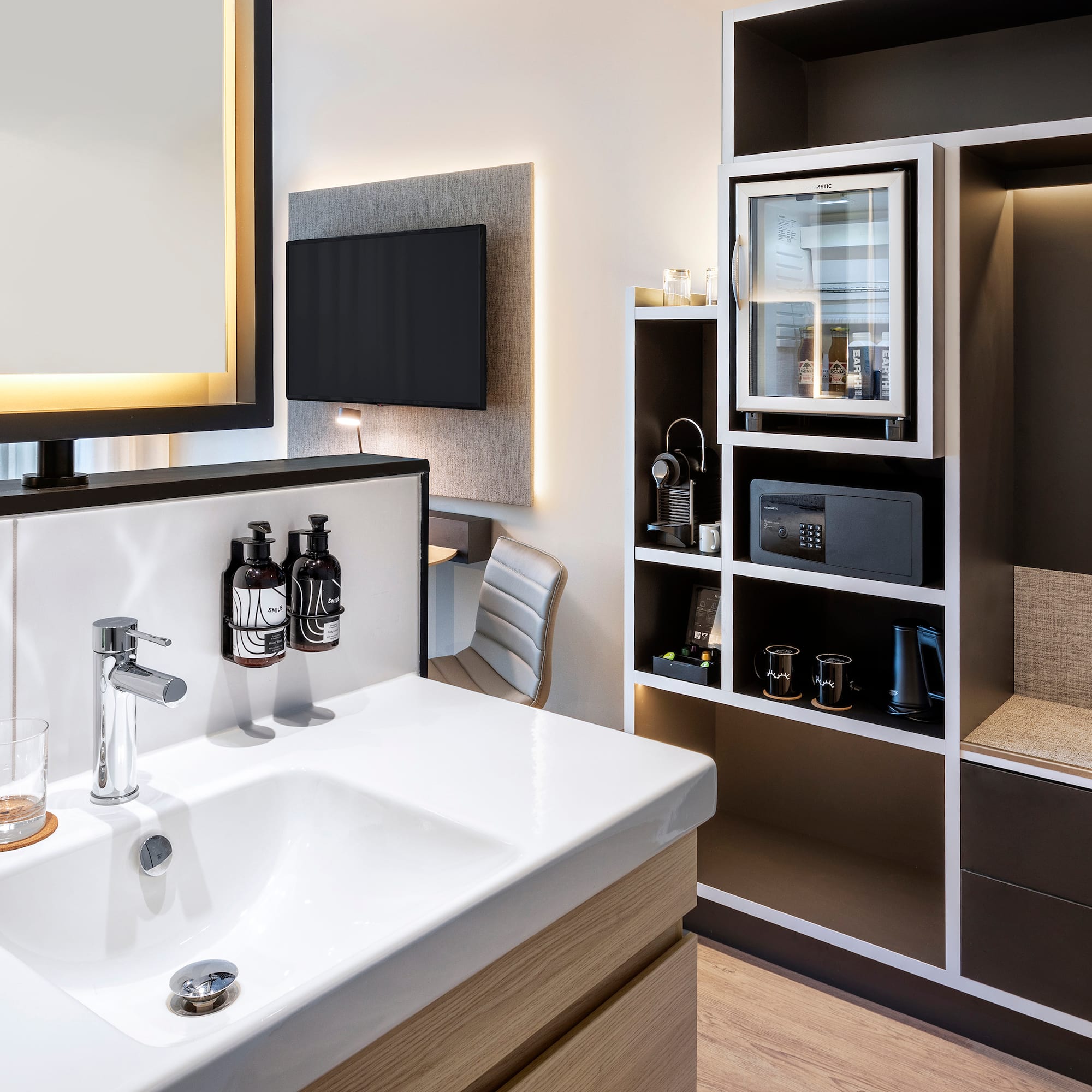 a bathroom with a sink and a mirror