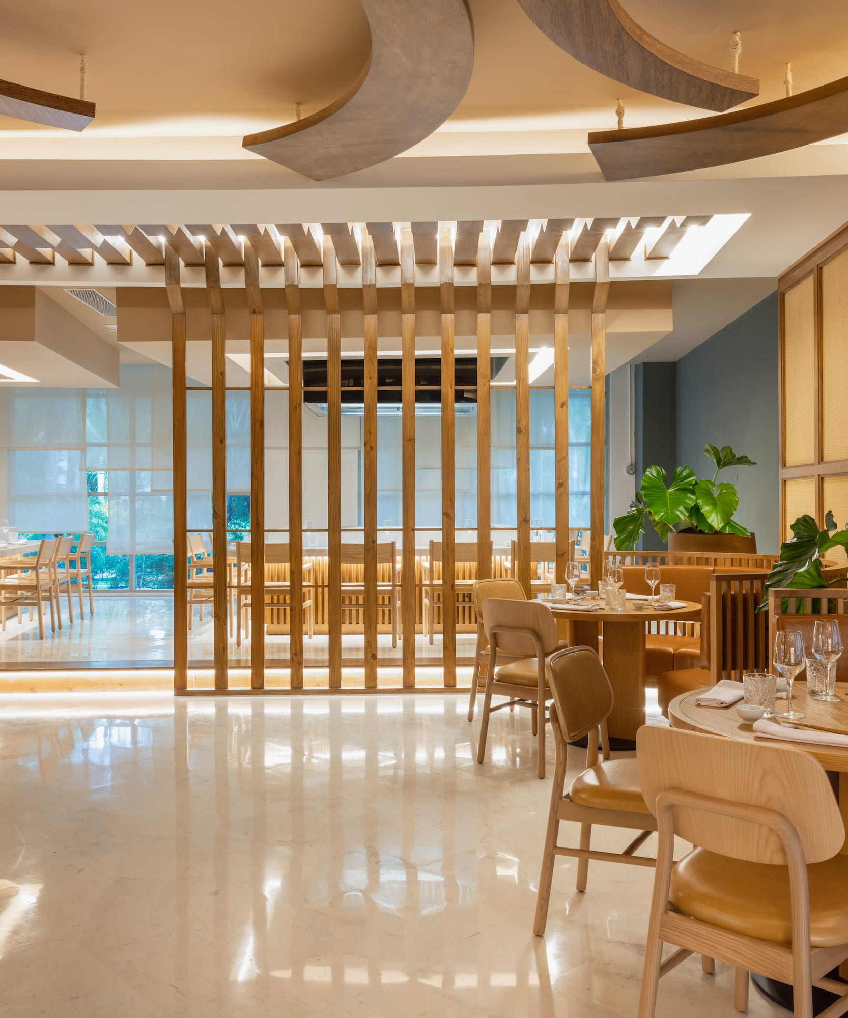 a room with tables and chairs