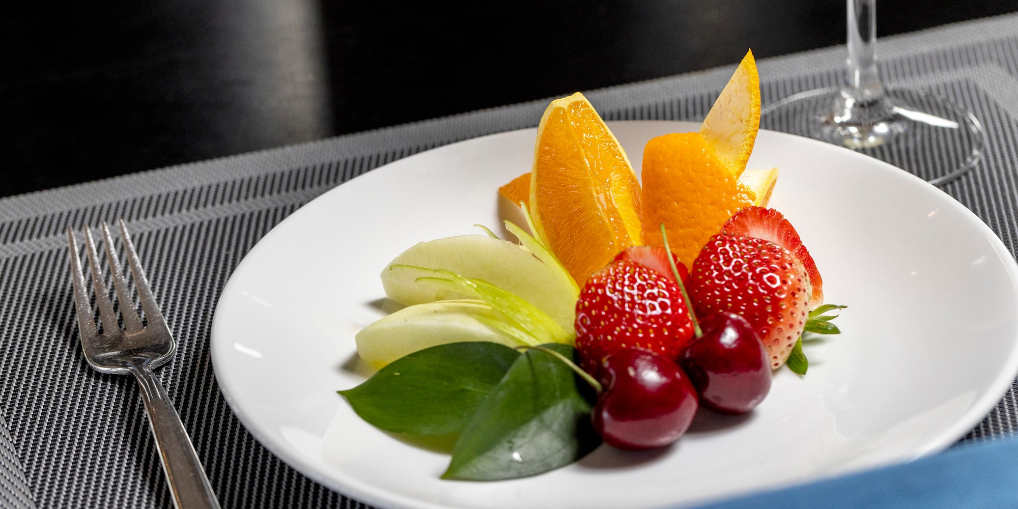 a plate of fruit on a table