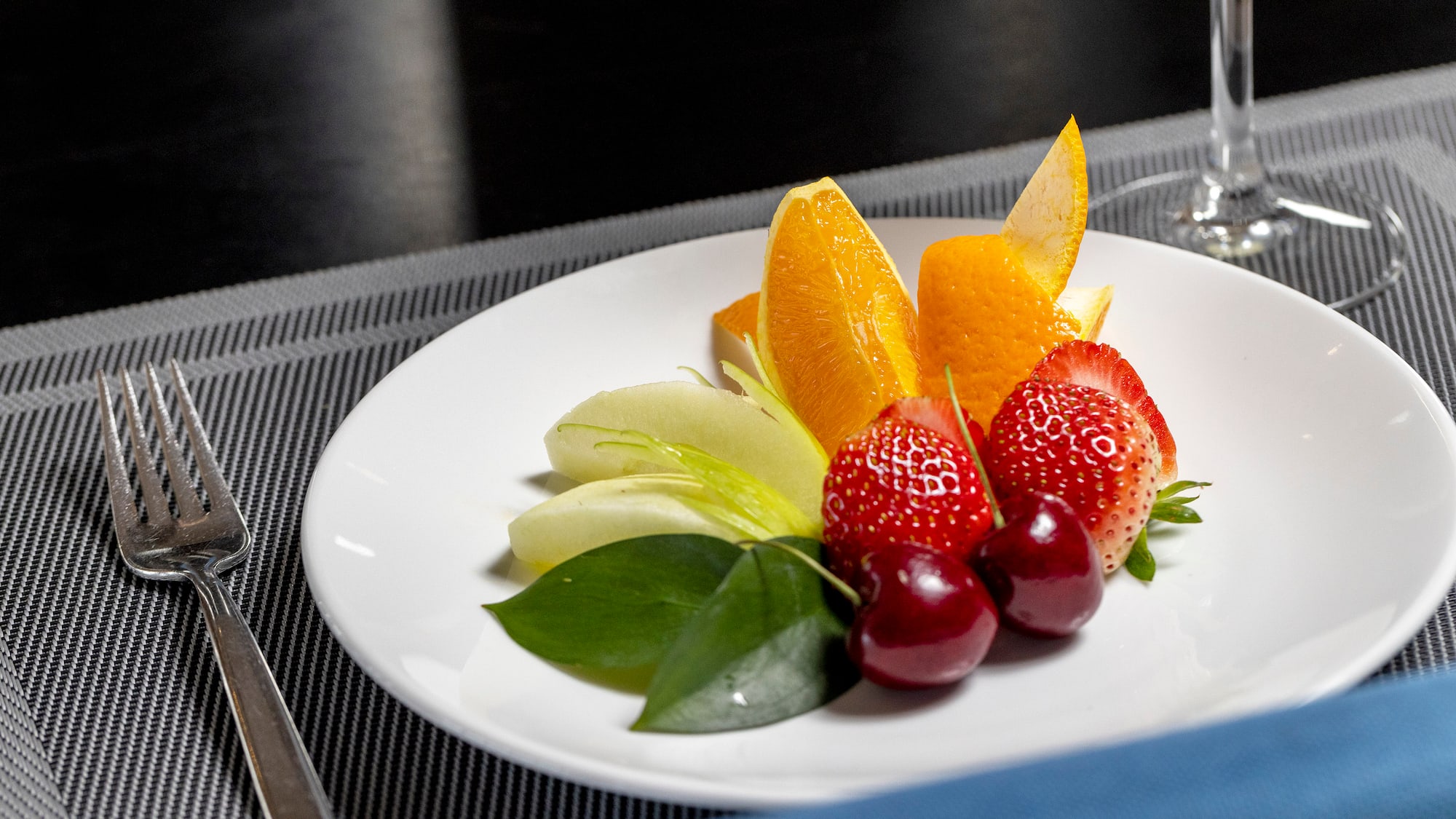 a plate of fruit on a table