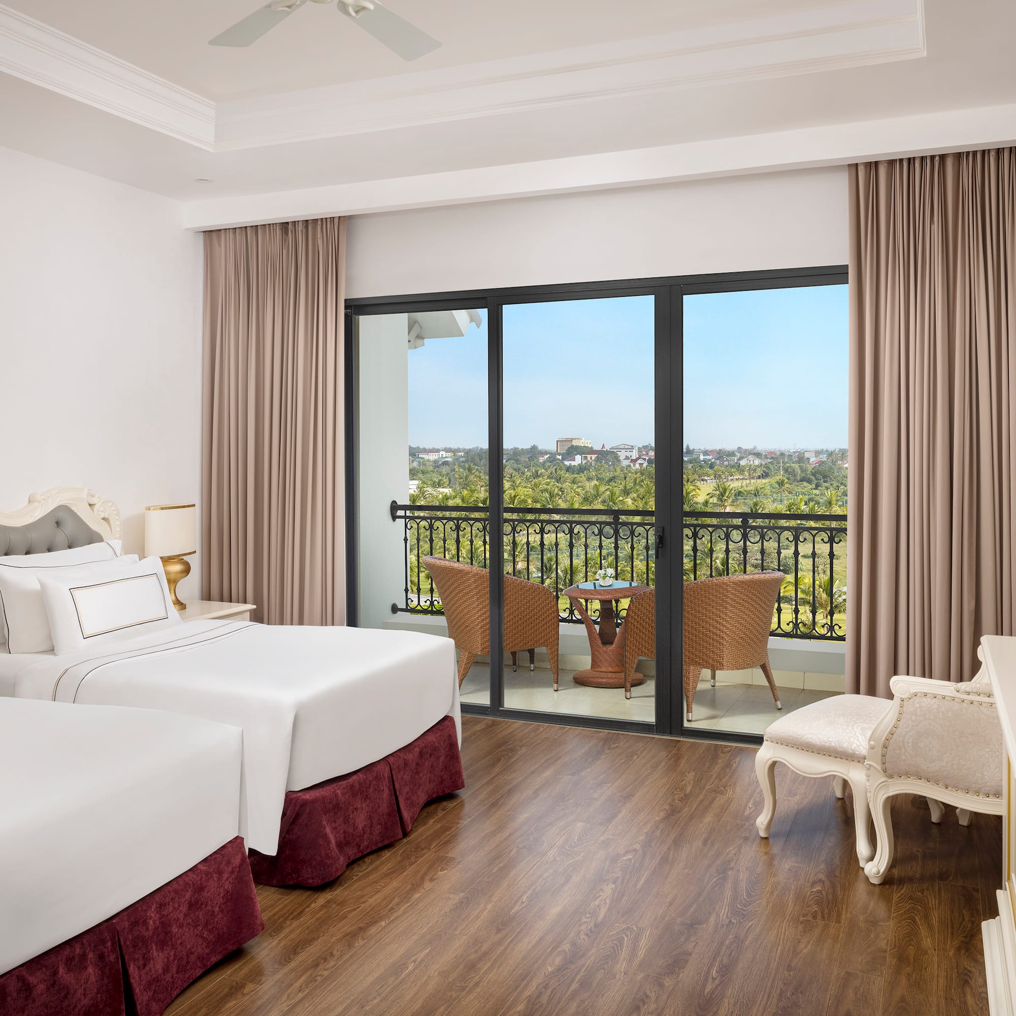 a room with two beds and a piano