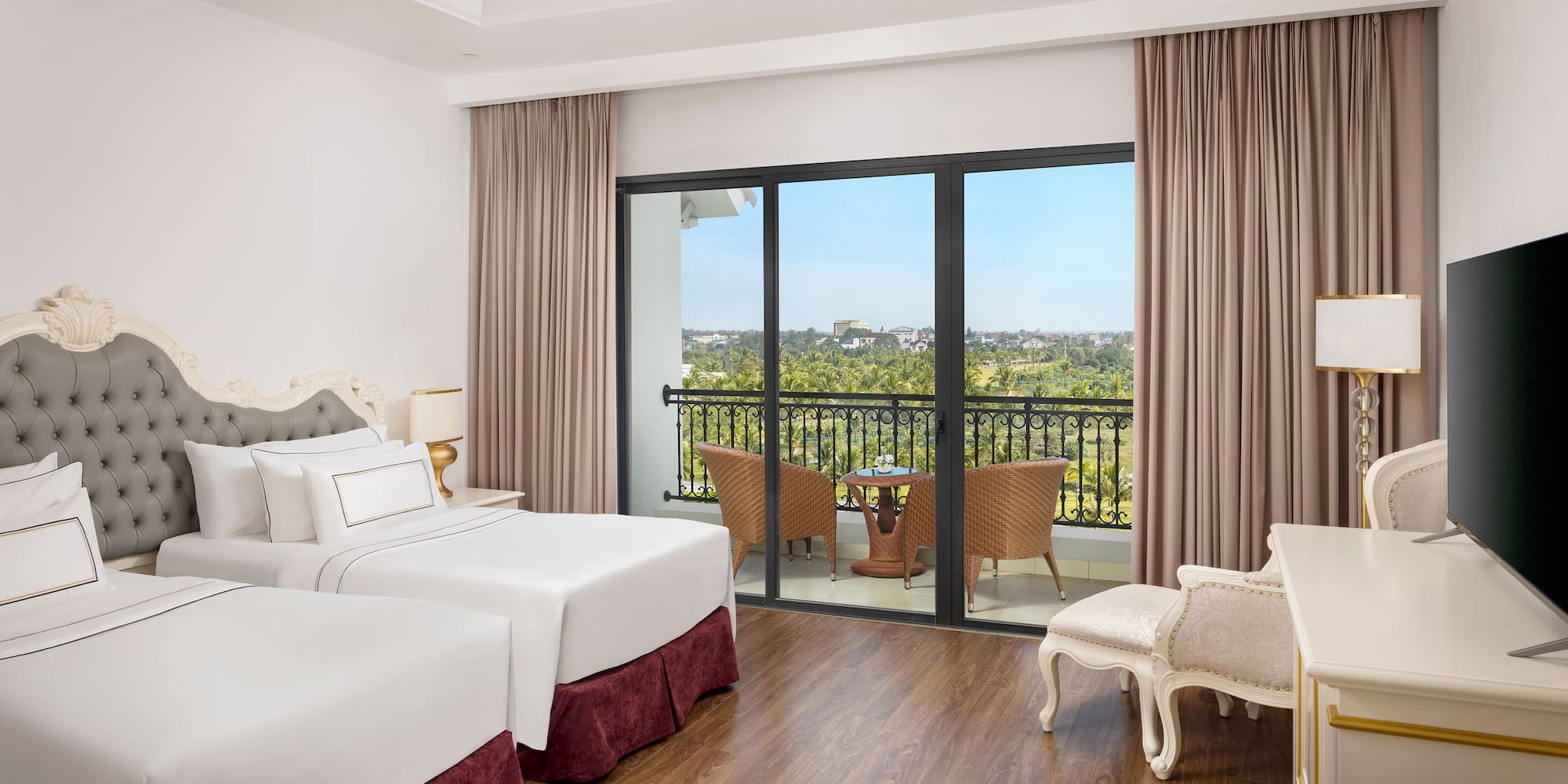 a room with two beds and a piano