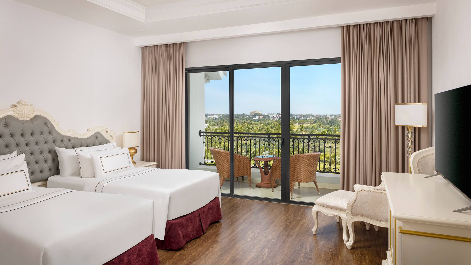 a room with two beds and a piano