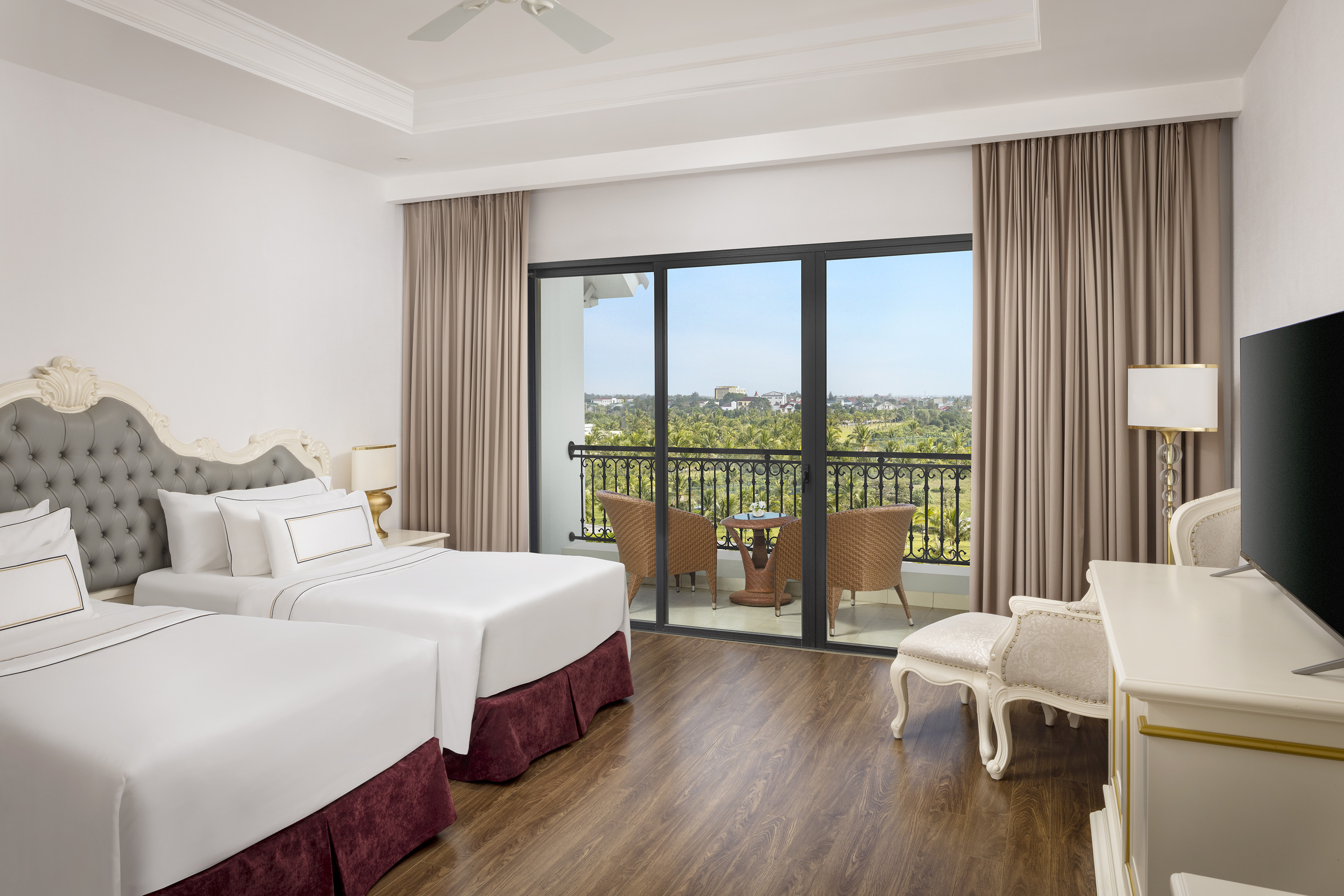 a room with two beds and a piano
